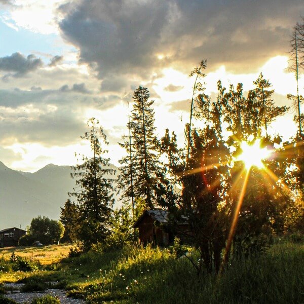 Mountain trail with a sunset against colourful clouds. Photo by Peter Robbins.